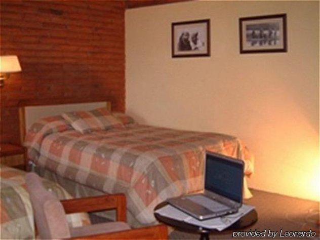 Puertolago Country Inn & Resort Отавало Номер фото